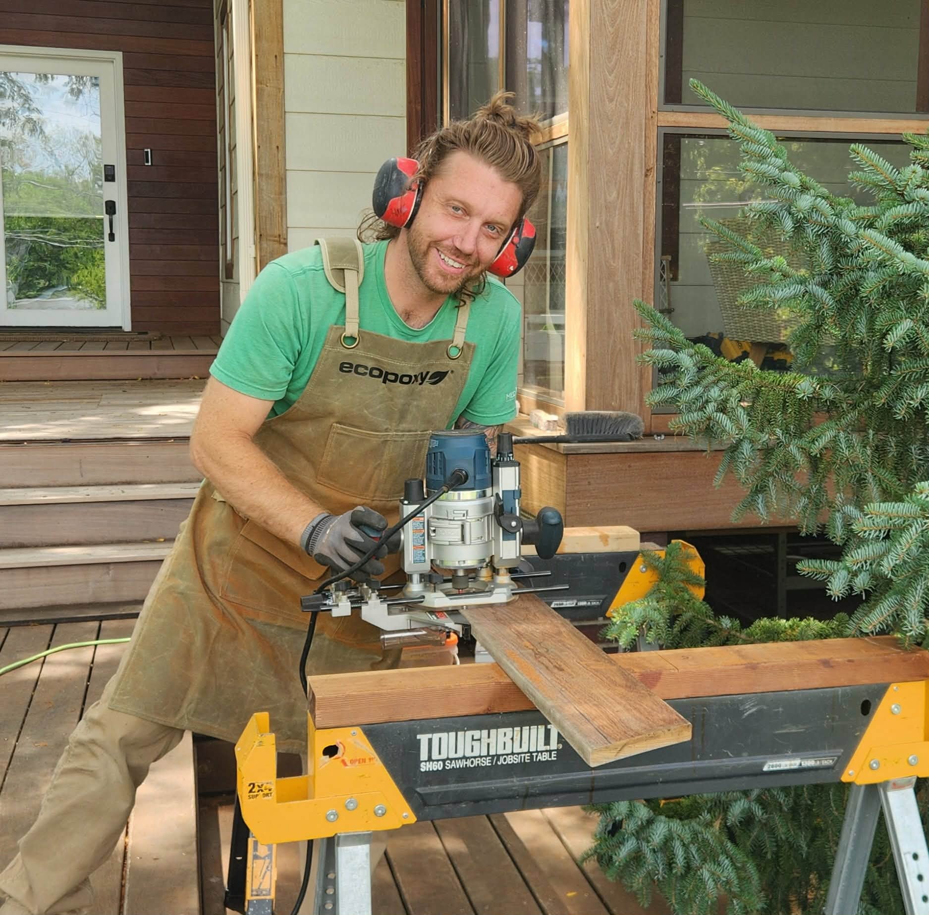 Craftsman working on custom woodwork in the studio
